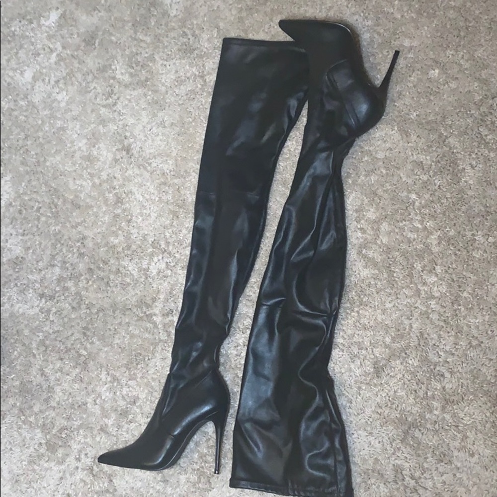 Knee high black leather boots